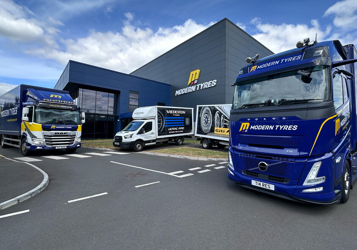 Modern Tyres delivery trucks outside the head office